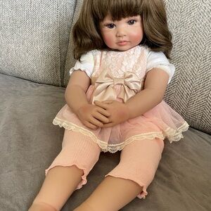 Adorable Pink Doll with Brown Hair